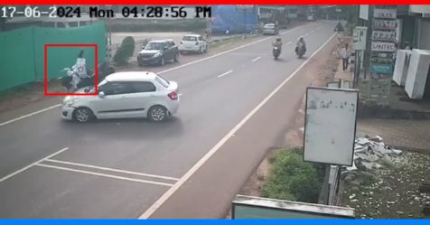 Speeding biker crashes into car taking a U-turn