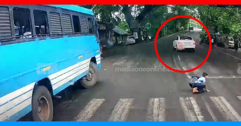 Kid crossing road hit by car