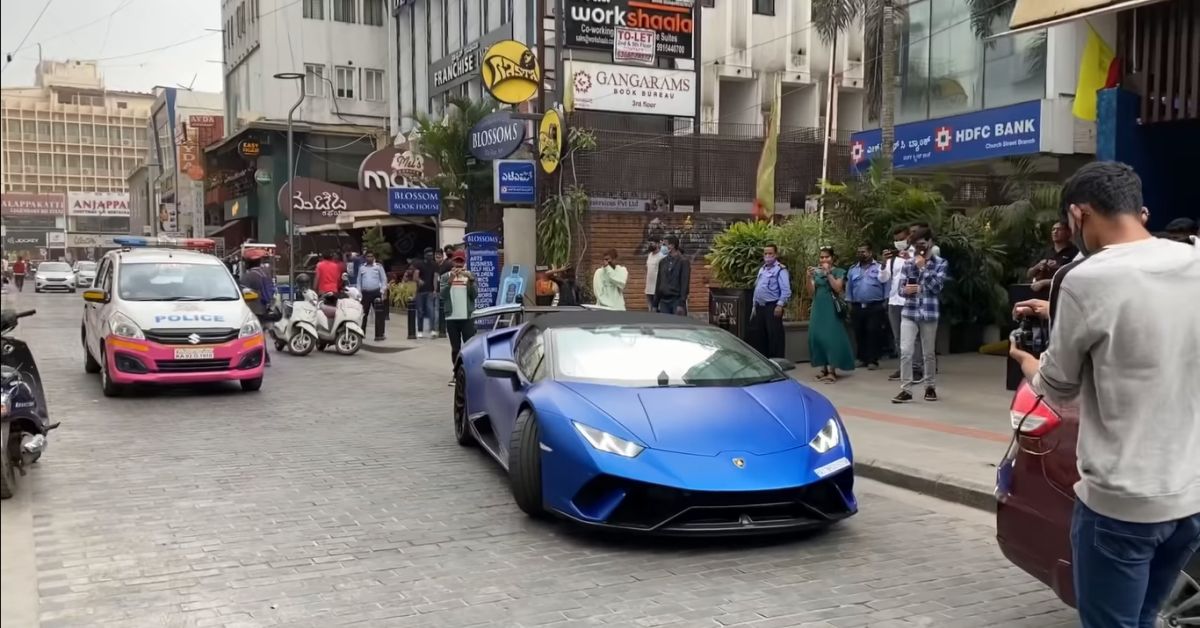 Lamborghini revs hard, police respond with siren!