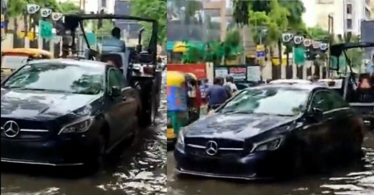 Mercedes-Benz stuck in a flooded Lucknow road rescued using tractor