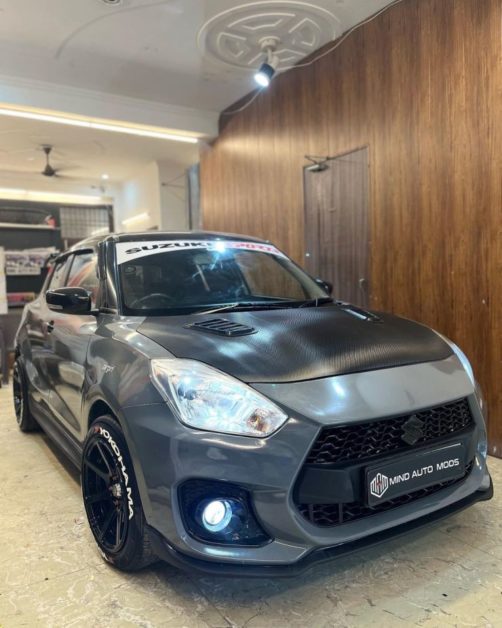 This modified Maruti Suzuki Swift hatchback with Sport GT body Kit and ...