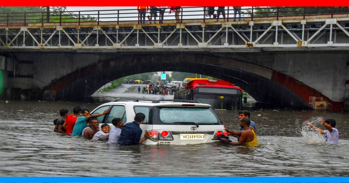 delhi under water logging floods cars stuck