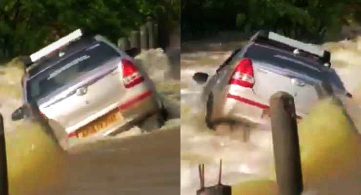 Toyota Etios sedan in river