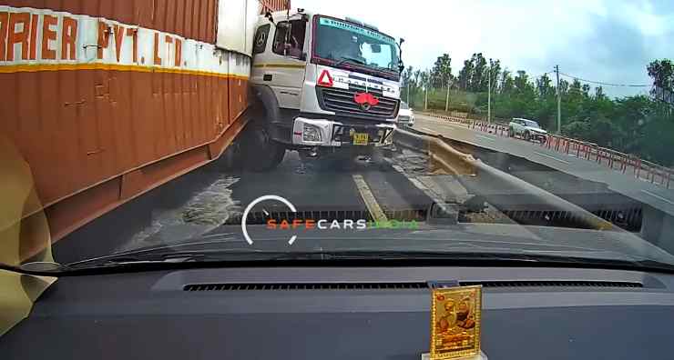 truck crashes into barrier saving mahindra thar