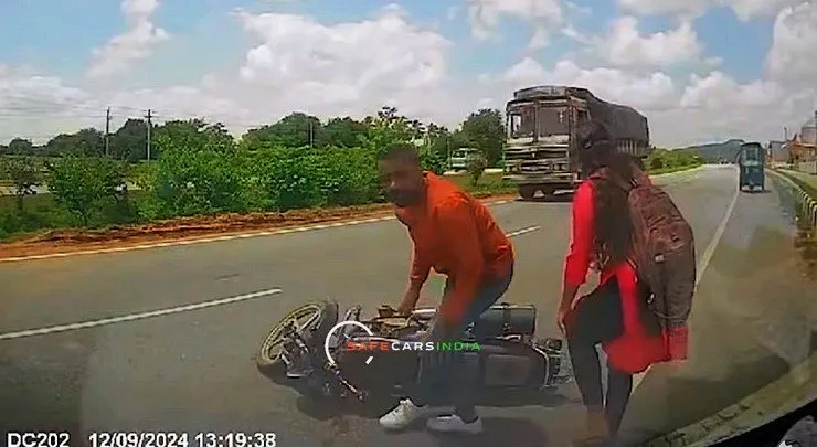 Biker-falls-after-rear-ending-car-on-highway